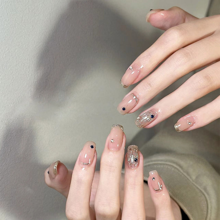 Elegant Press-On Nail Art Set with Glitter and Charming Accents Kalsten