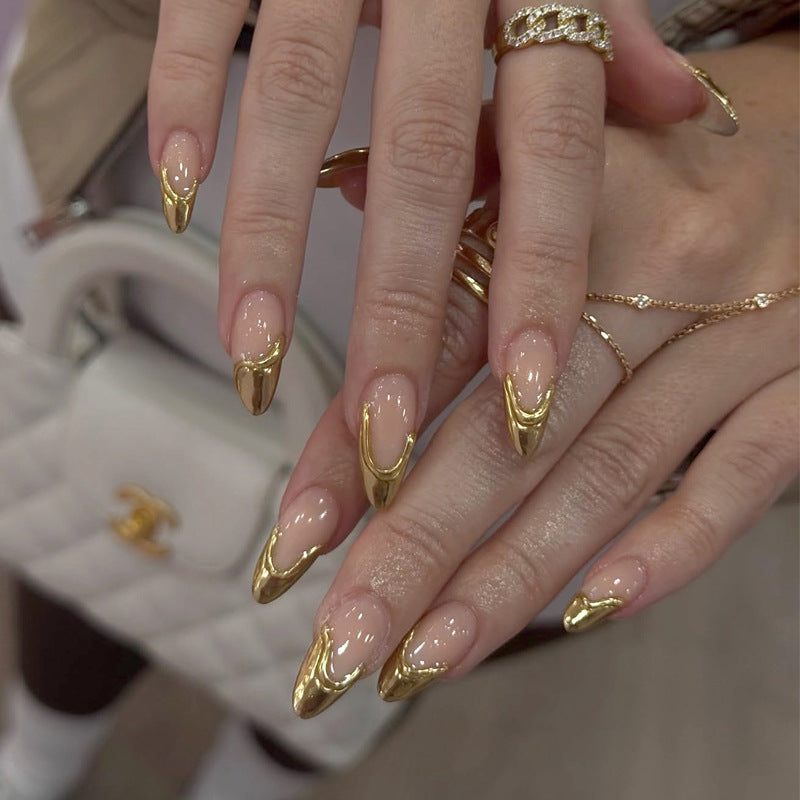 Stiletto Nail Enhancements with Gold Accents Kalsten