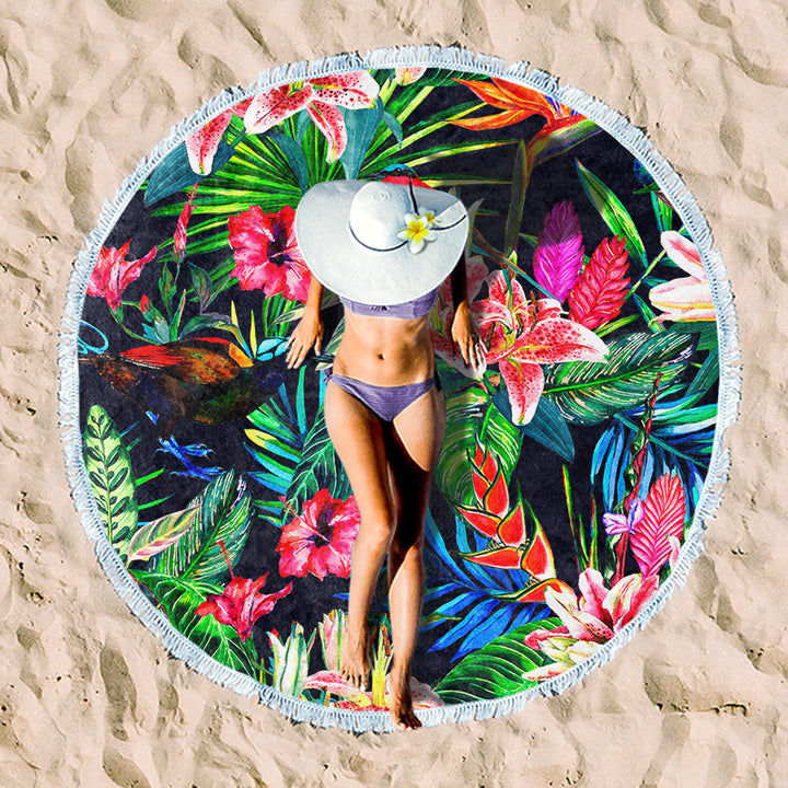 Round beach towel with colorful, tropical floral pattern and fringe decoration Kalsten