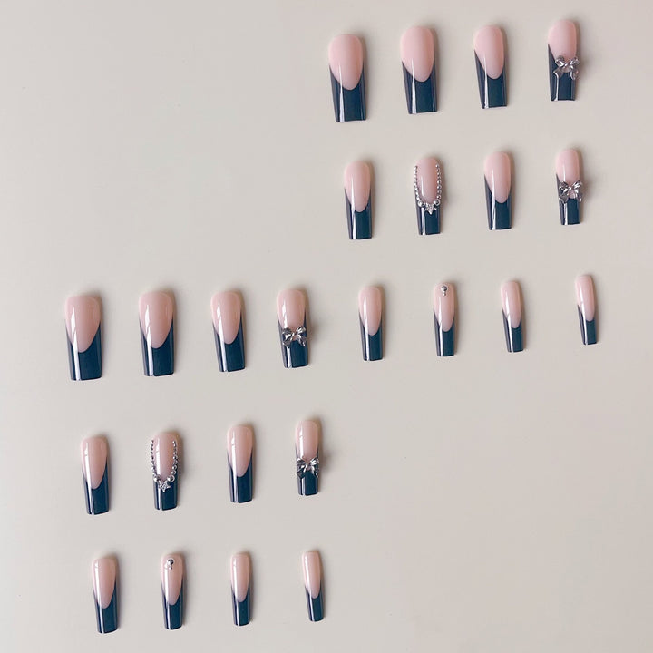 Artificial nail set with glamorous rhinestone accents and elegant 3D designs Kalsten