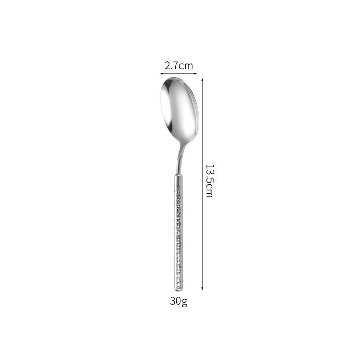 Elegant dessert spoon with elaborate handle design Kalsten
