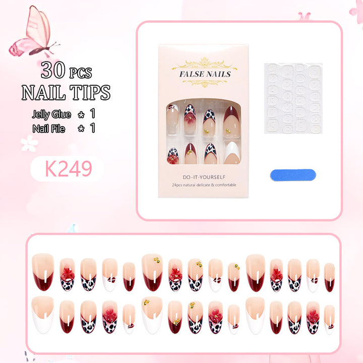 Artificial nail set with elegant floral patterns and glamorous details Kalsten