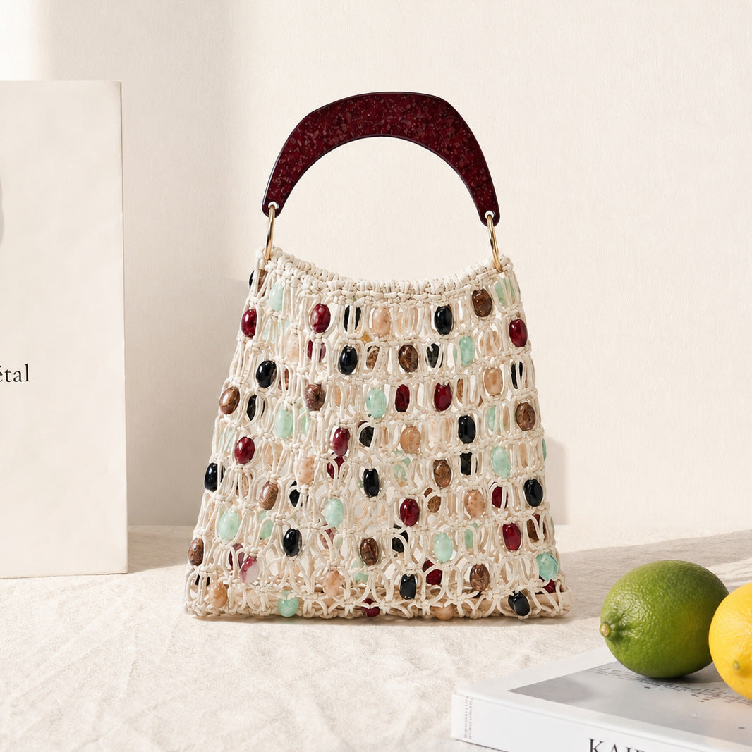 Handcrafted designer shoulder bag with unique stone accents Kalsten