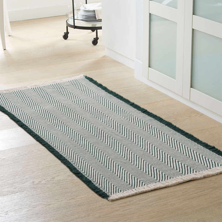 Handwoven cotton bath mat with herringbone pattern and fringes Kalsten