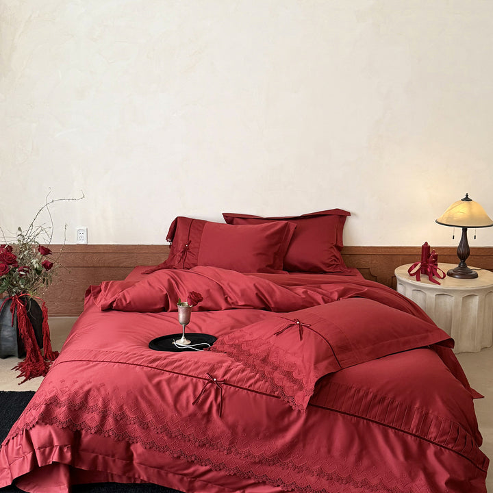Luxurious bed linen set with lace edging, ruffles, and decorative bows Kalsten