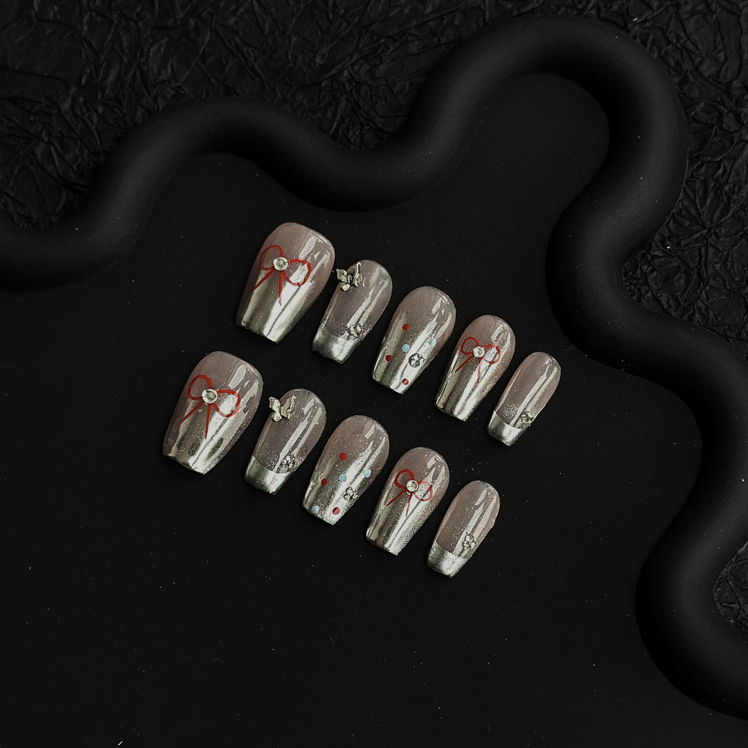 Artistic Press-On Nail Art Set with Bow and Gem Details