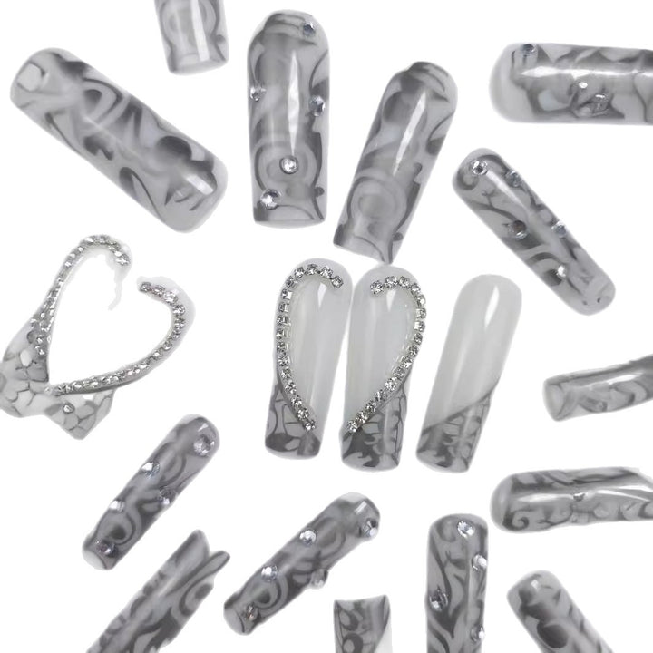Artificial nails with elegant 3D pattern and radiant rhinestone decorations Kalsten