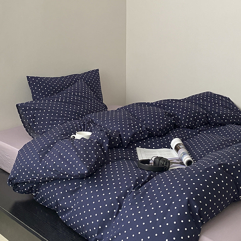 Cotton percale bedding set with minimalist polka dot pattern and hotel closure
