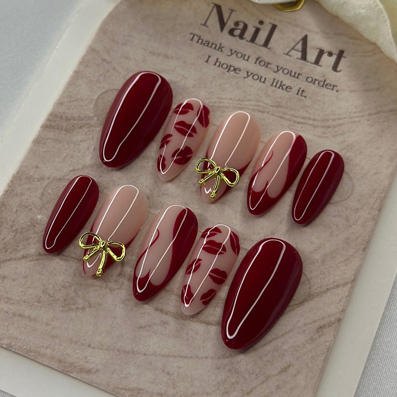 Artificial nail set with elegant bow and lip designs Kalsten