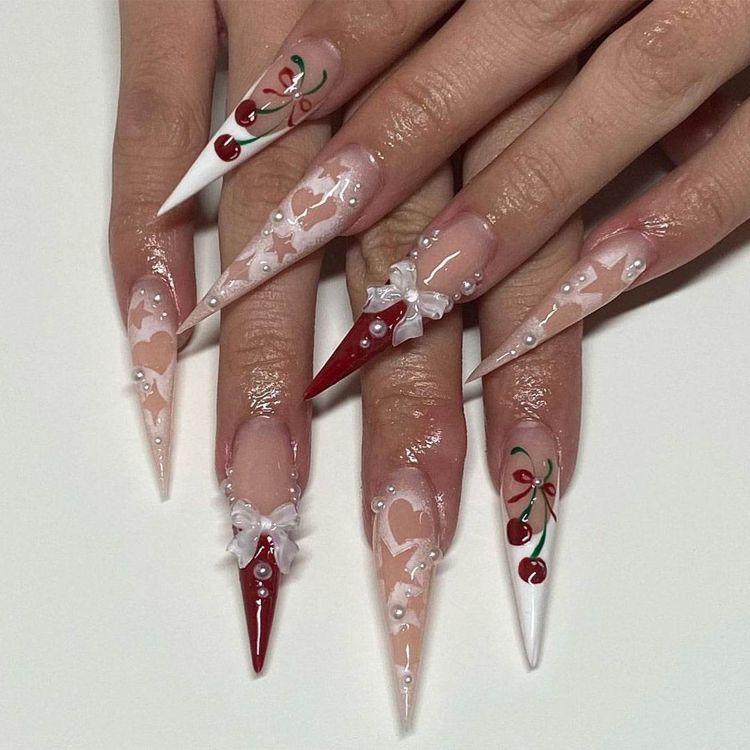 Artificial Nail Art with Festive Designs Kalsten