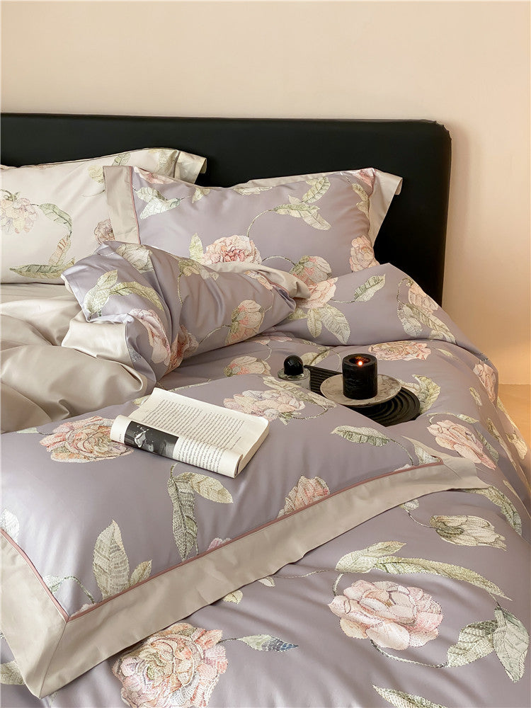 Luxurious cotton satin bedding set with large watercolor rose motif and silky feel