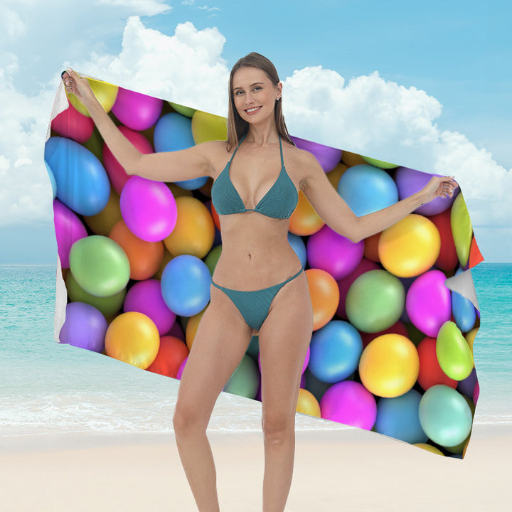 Beach towel with vibrant tropical plant motif Kalsten