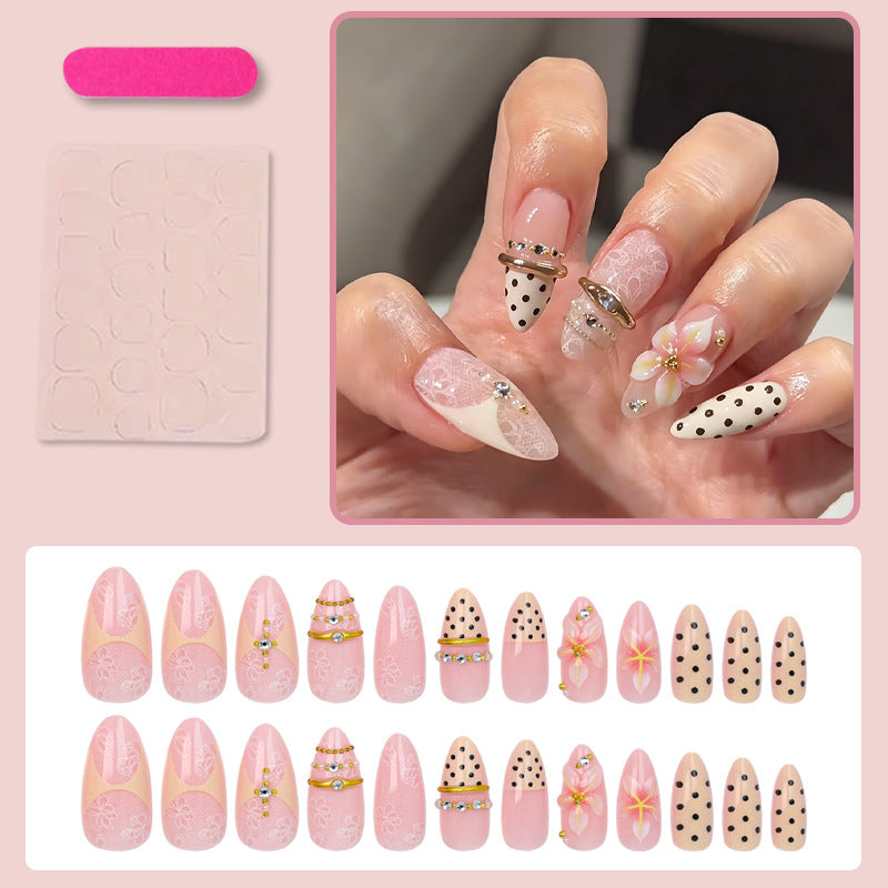 Artificial nail set with delicate floral patterns and elegant accents Kalsten