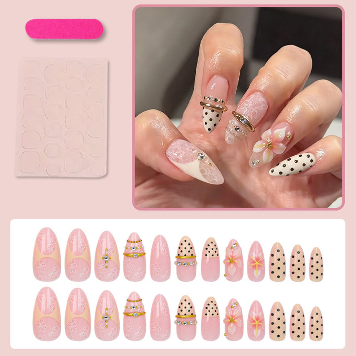 Artificial nail set with delicate floral patterns and elegant accents Kalsten