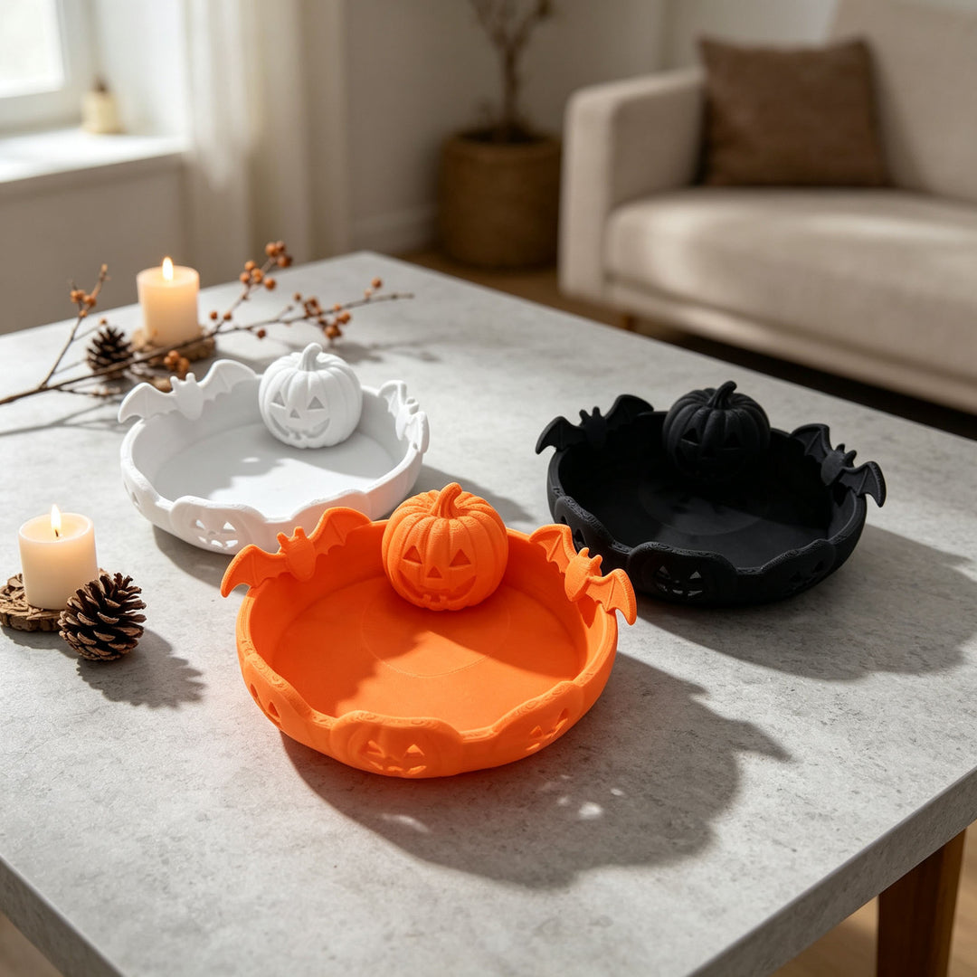 Halloween decorative bowl with carved pumpkin and bat appliqué