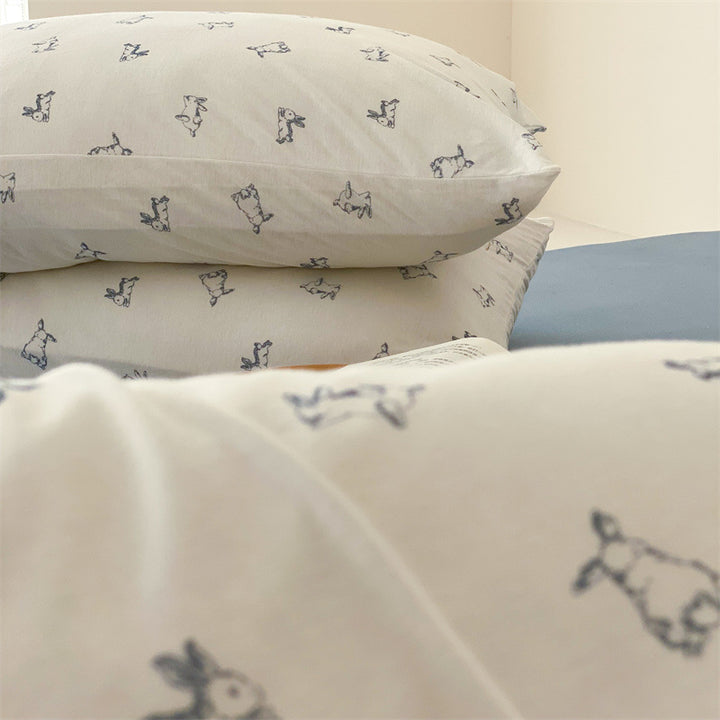 Finely woven cotton bedding set with minimalist dog sketches