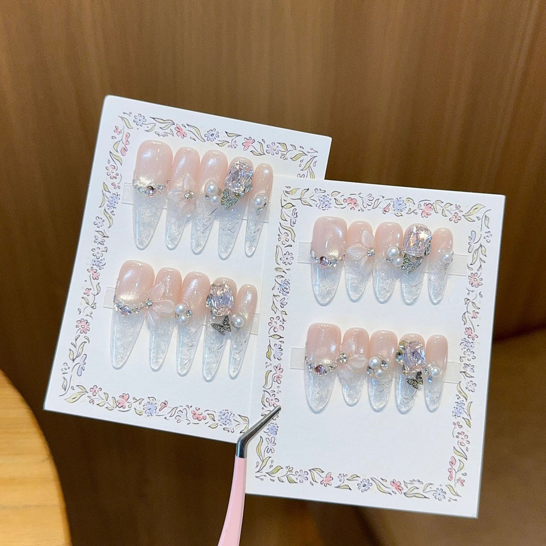 Artificial nails with delicate glitter and pearl decoration Kalsten