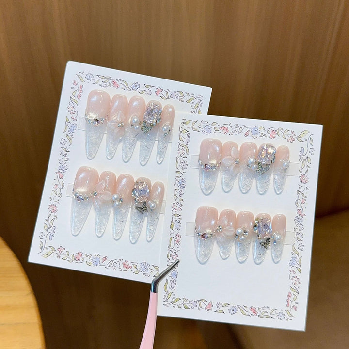 Artificial nails with delicate glitter and pearl decoration Kalsten
