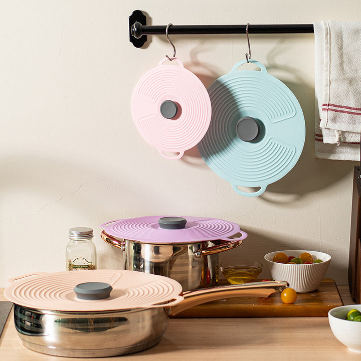 Silicone cooking lid with multifunctional steam valve Kalsten