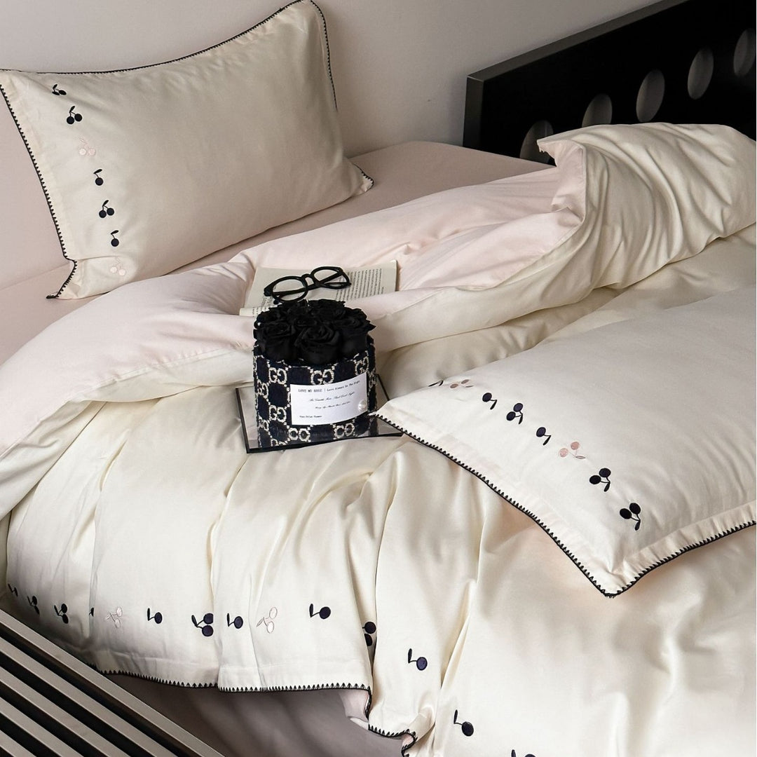 Luxurious cotton satin bedding set with subtly embroidered cherries