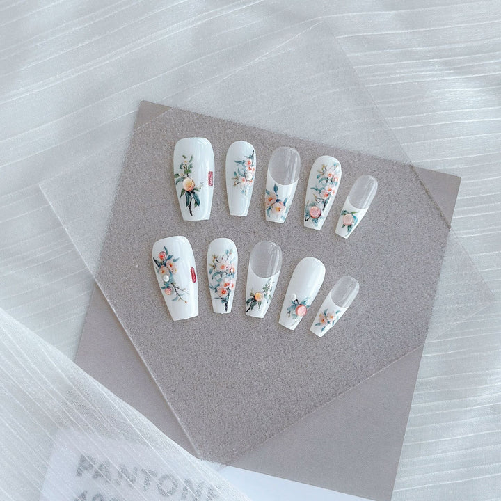 Artistic Press-On Nail Art Set with Heart and Celestial Designs