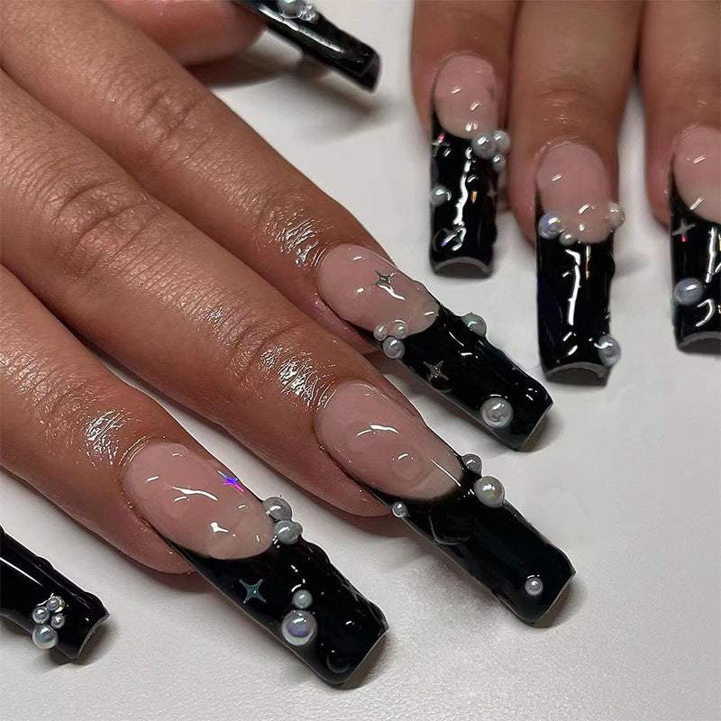 Artificial nail art with pearl and shine elements Kalsten