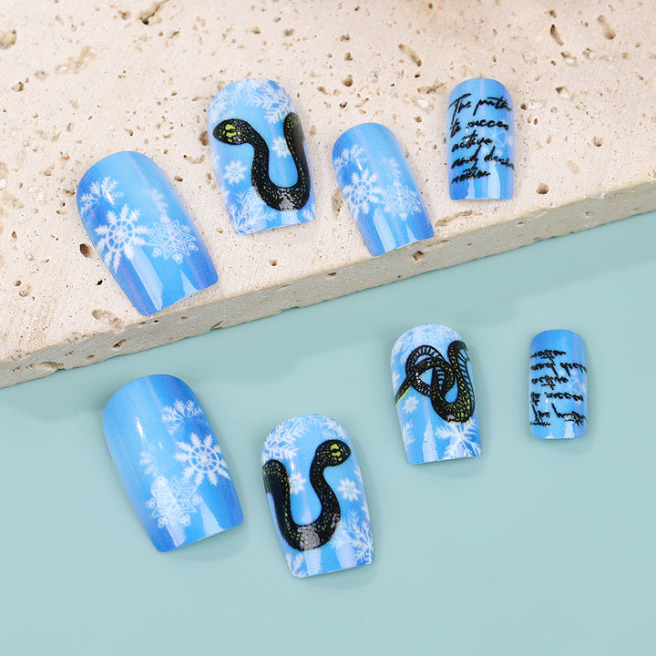Creative art nails with snowflake and snake motif Kalsten