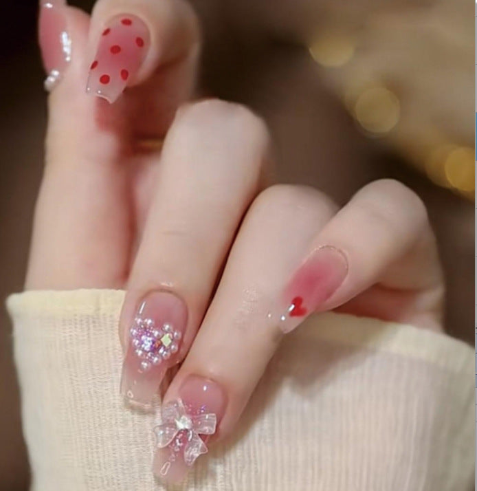 Artistic Nail Art with Glitter and Flower Applications Kalsten