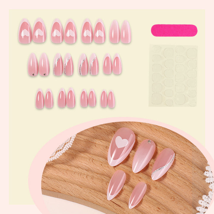 Acrylic nail set with romantic heart and glitter accents Kalsten