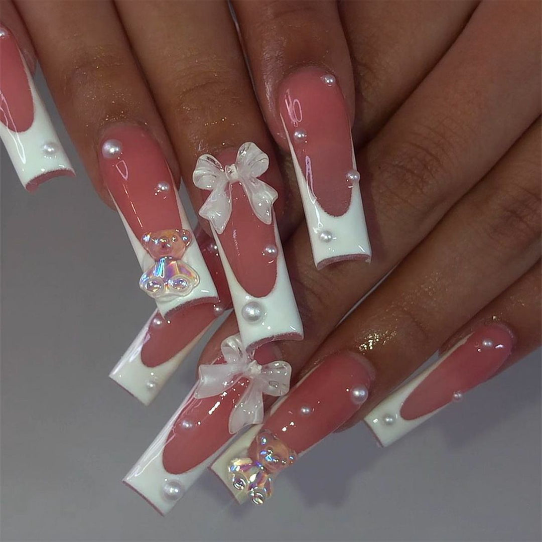 Elegant artificial nails with delicate bows and pearls Kalsten