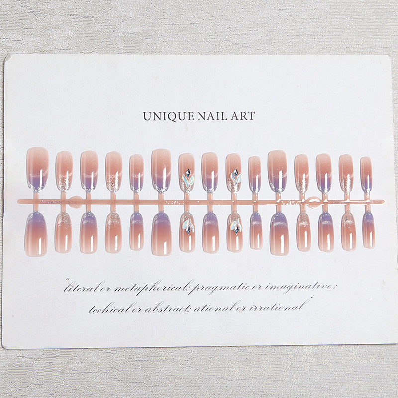 Acrylic nail set with elegant glitter effect and beautified embellishments Kalsten