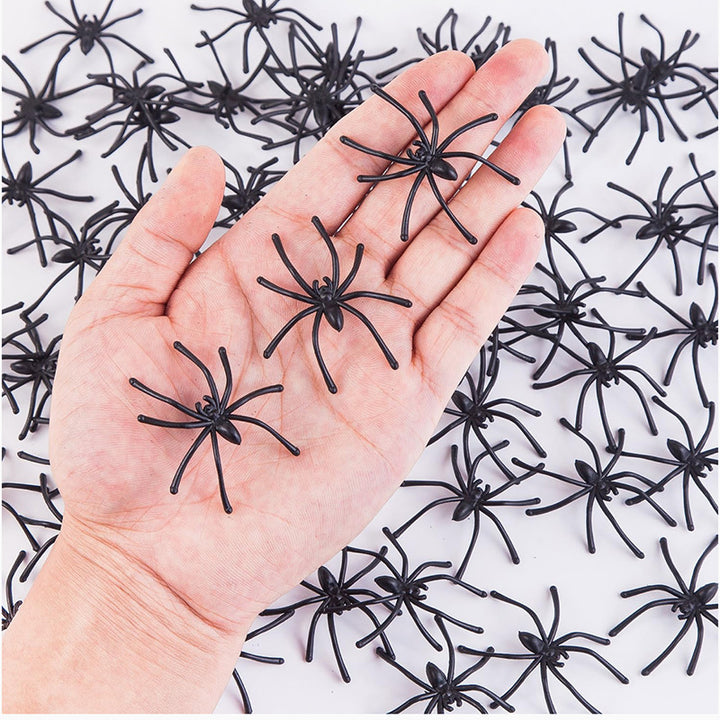 Decorative Halloween spider web with artificial spiders