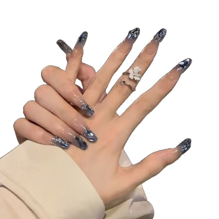 Artistic nail tips with playful motifs Kalsten
