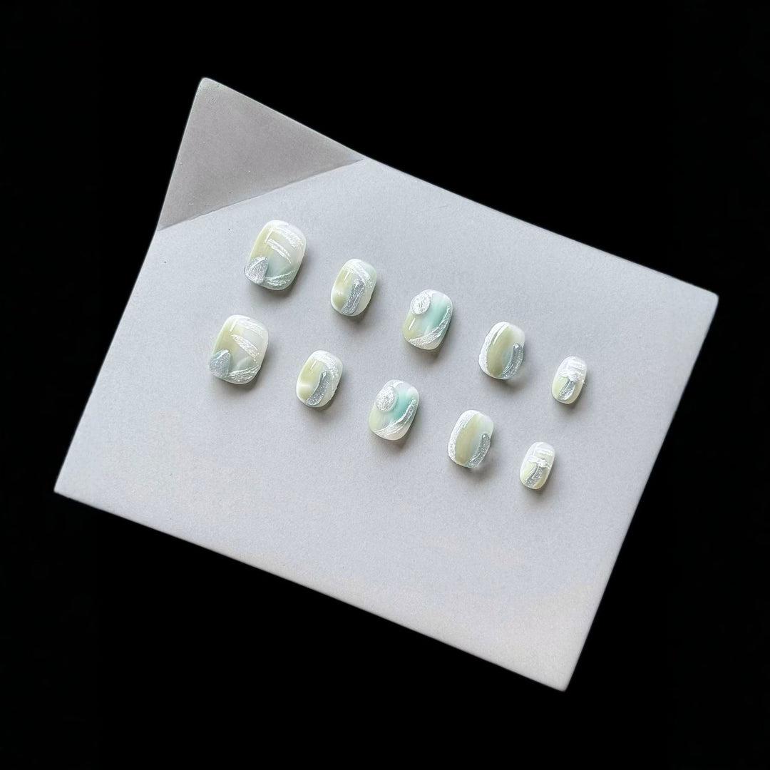 Artistic Press-On Nail Set with Glossy Marble Design