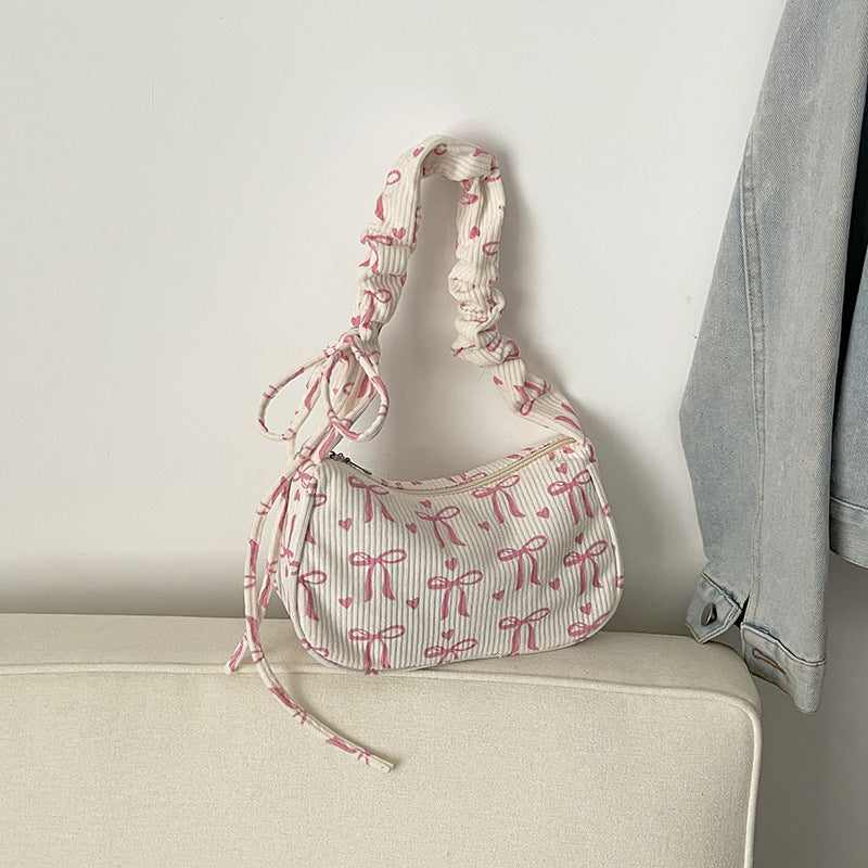 Playful Bow-Print Shoulder Bag