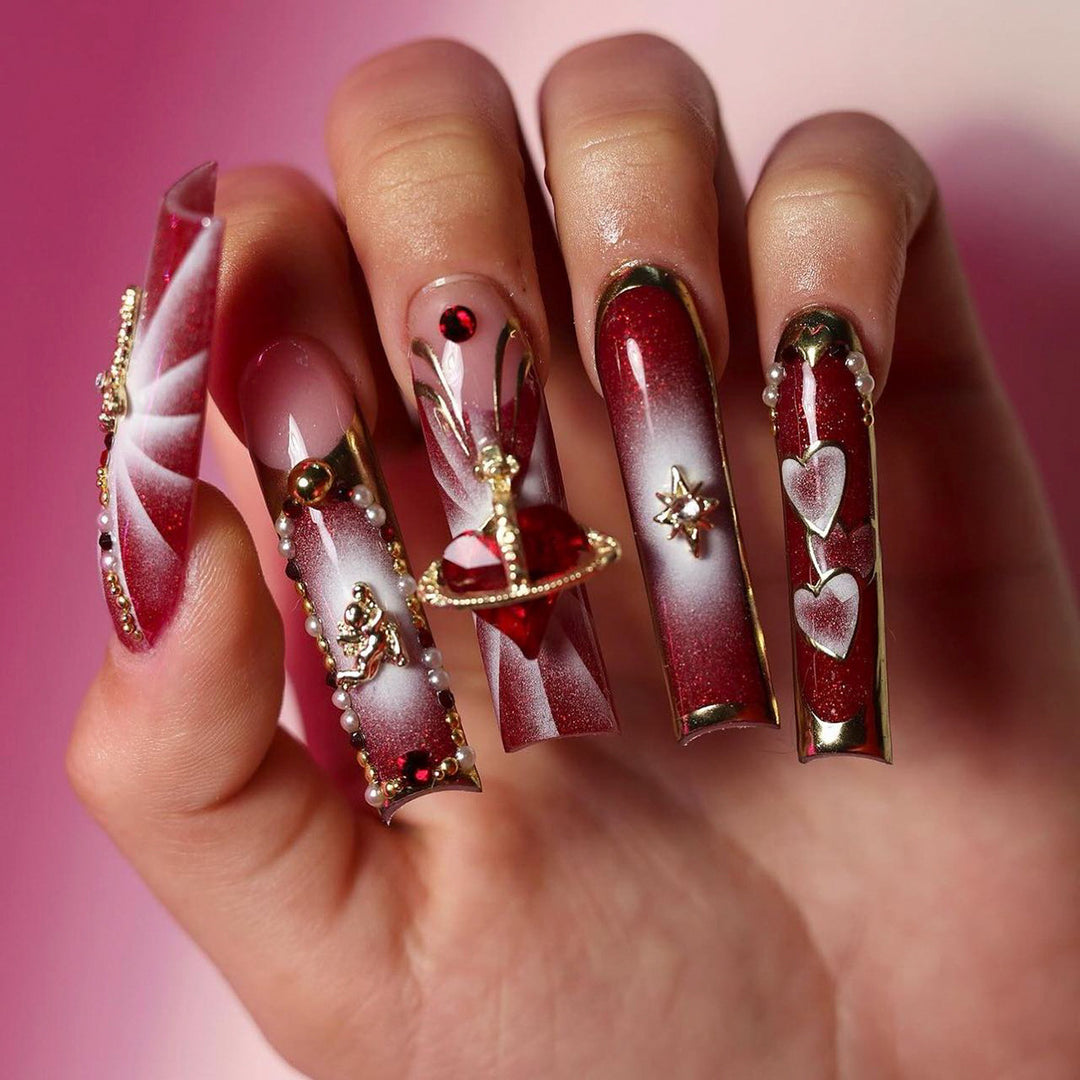 Artistic Nail Art with Glitter and Heart Designs Kalsten