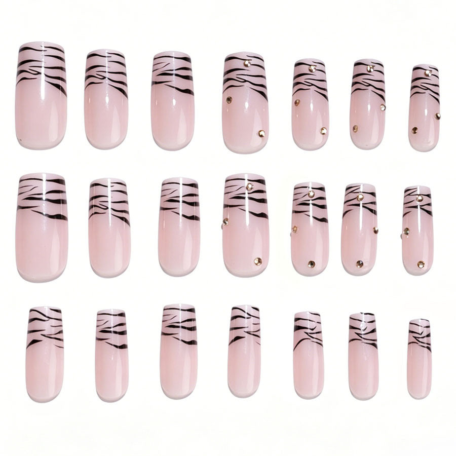 Art nail set with elegant lines and glitter accents Kalsten