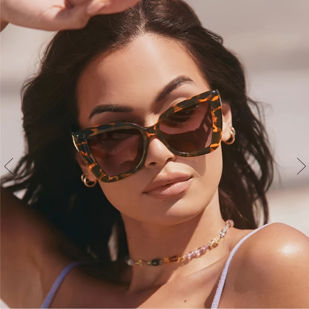 Ladies modern cat-eye sunglasses with clear frame and UV protection Kalsten