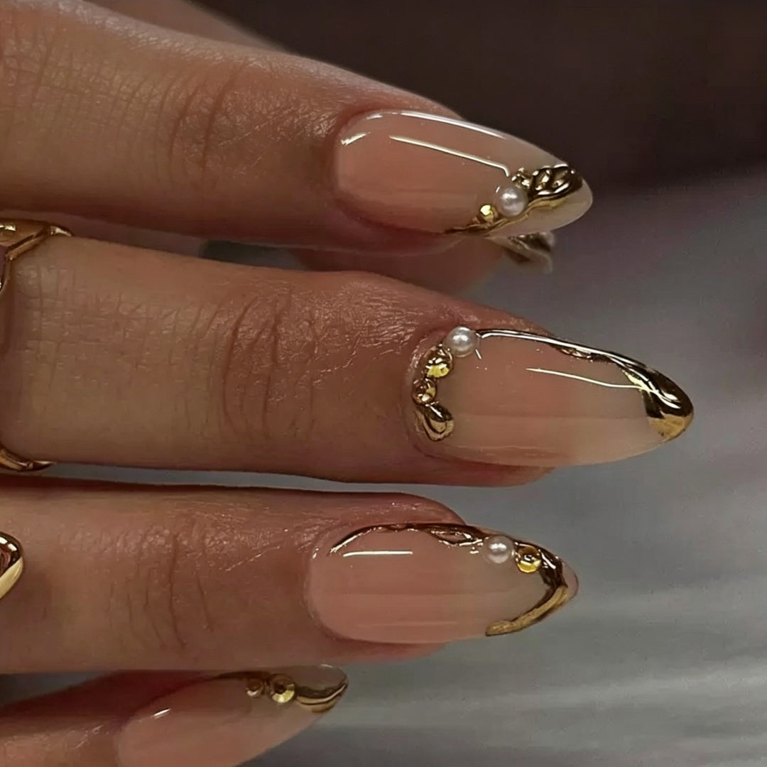 Elegant Gold-Decorated Acrylic Nail Art Enhancements Kalsten