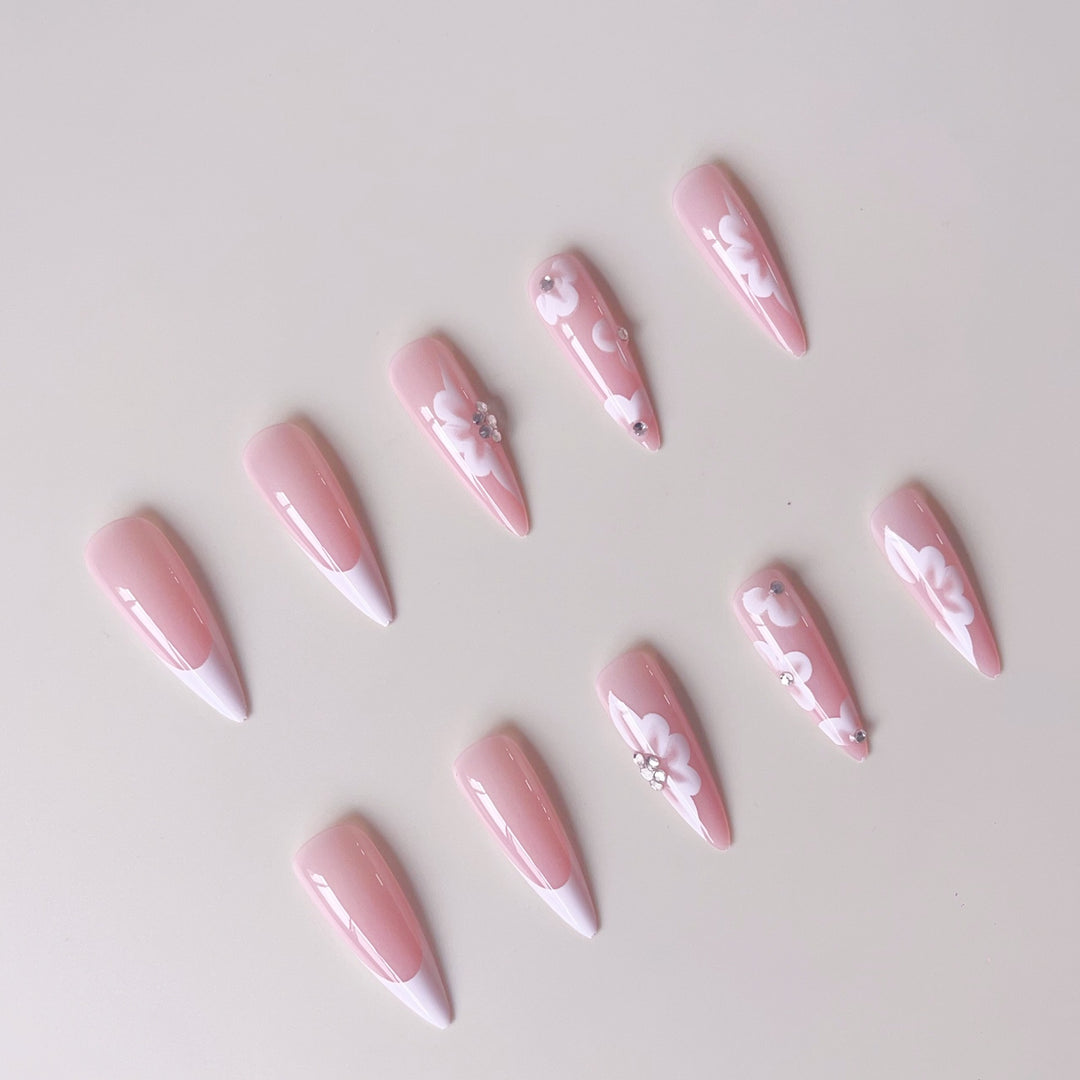 Elegant artificial nail set with floral design and glitter accents Kalsten