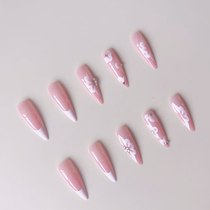 Elegant artificial nail set with floral design and glitter accents Kalsten