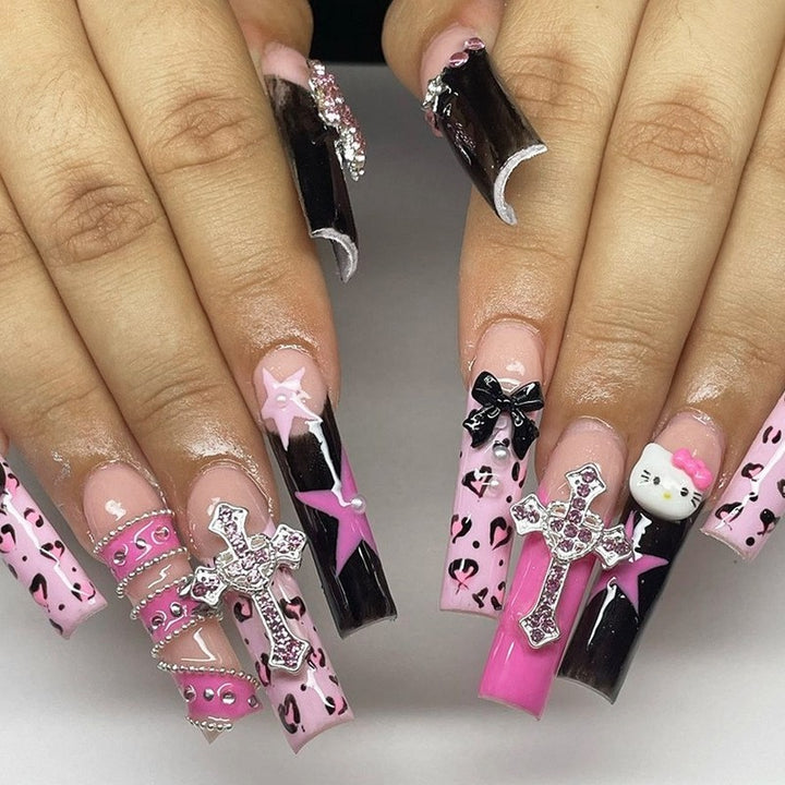 Glamorous artificial nail set with sparkling rhinestones and cross decorations Kalsten