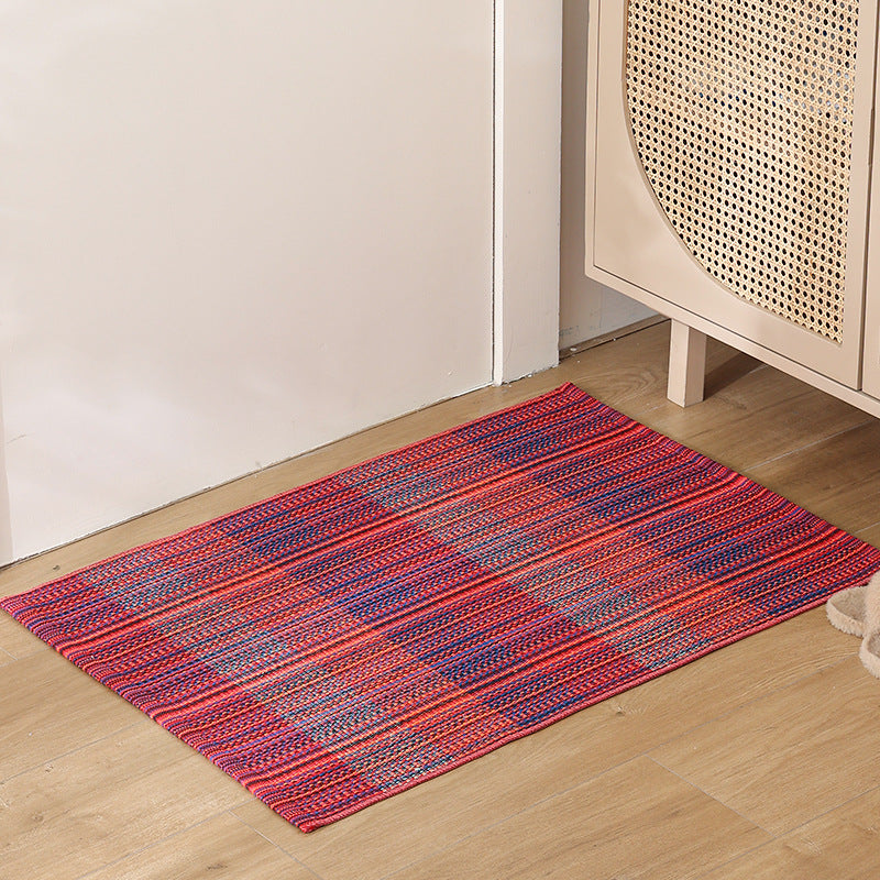 Striped cotton doormat with non-slip bottom and decorative woven edge Kalsten