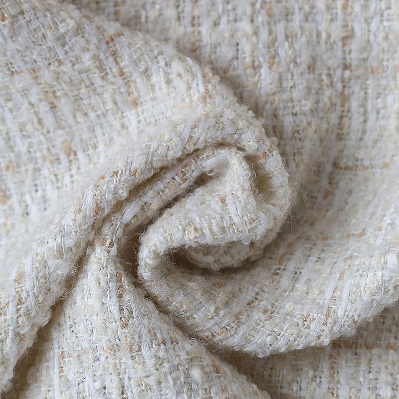 Square cushion cover made of textured bouclé blend with decorative piped seam Kalsten