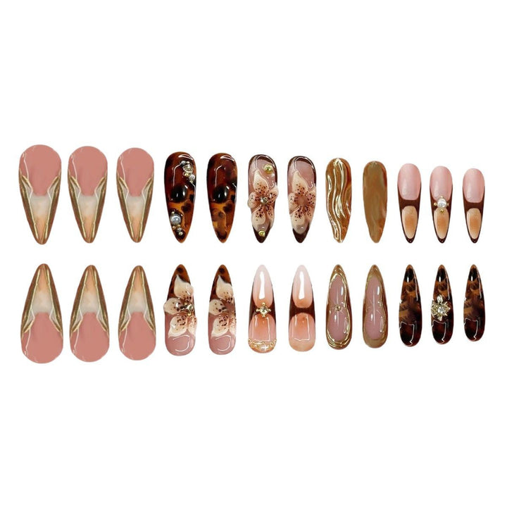 Artistic Stiletto Press-On Nail Art with Floral and Gemstone Accents Kalsten