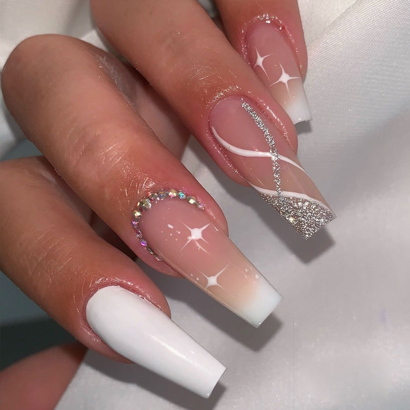 Elegant Stiletto Press-On Nail Art with Rhinestone Accents Kalsten