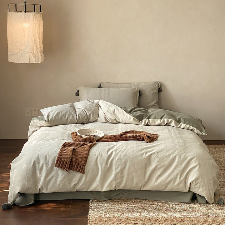 Finely textured cotton satin bedding set with tone-on-tone relief