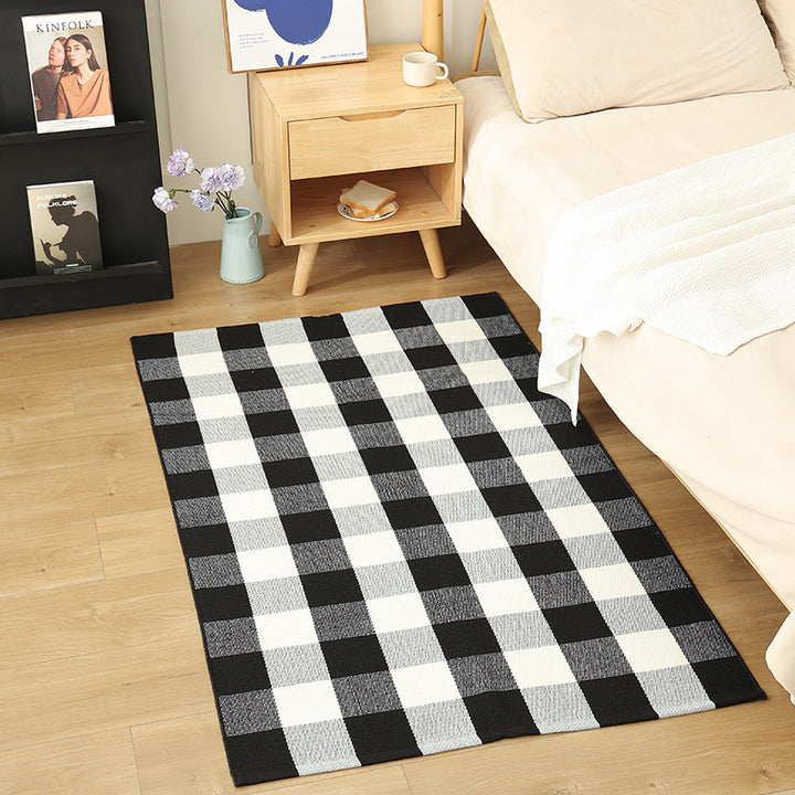 Modern flat-weave area rug with contrasting stripes and non-slip underside Kalsten