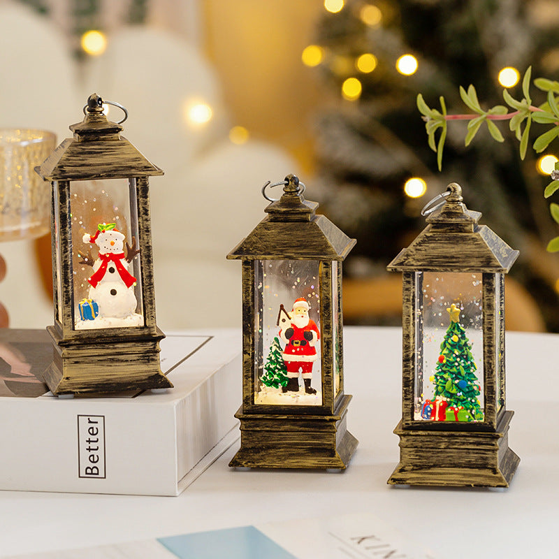 Christmas lantern with LED lighting and decorative snow effect
