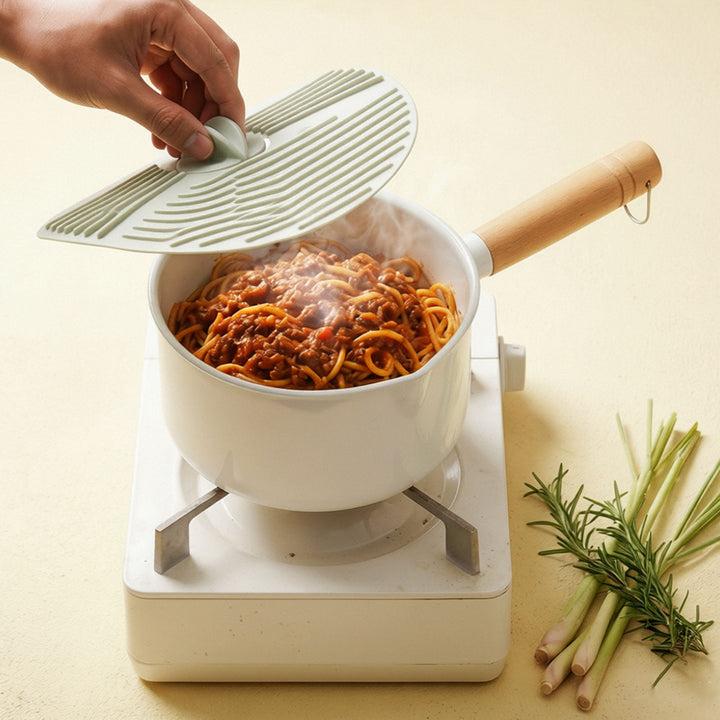 Silicone kitchen lid with innovative steam valve Kalsten